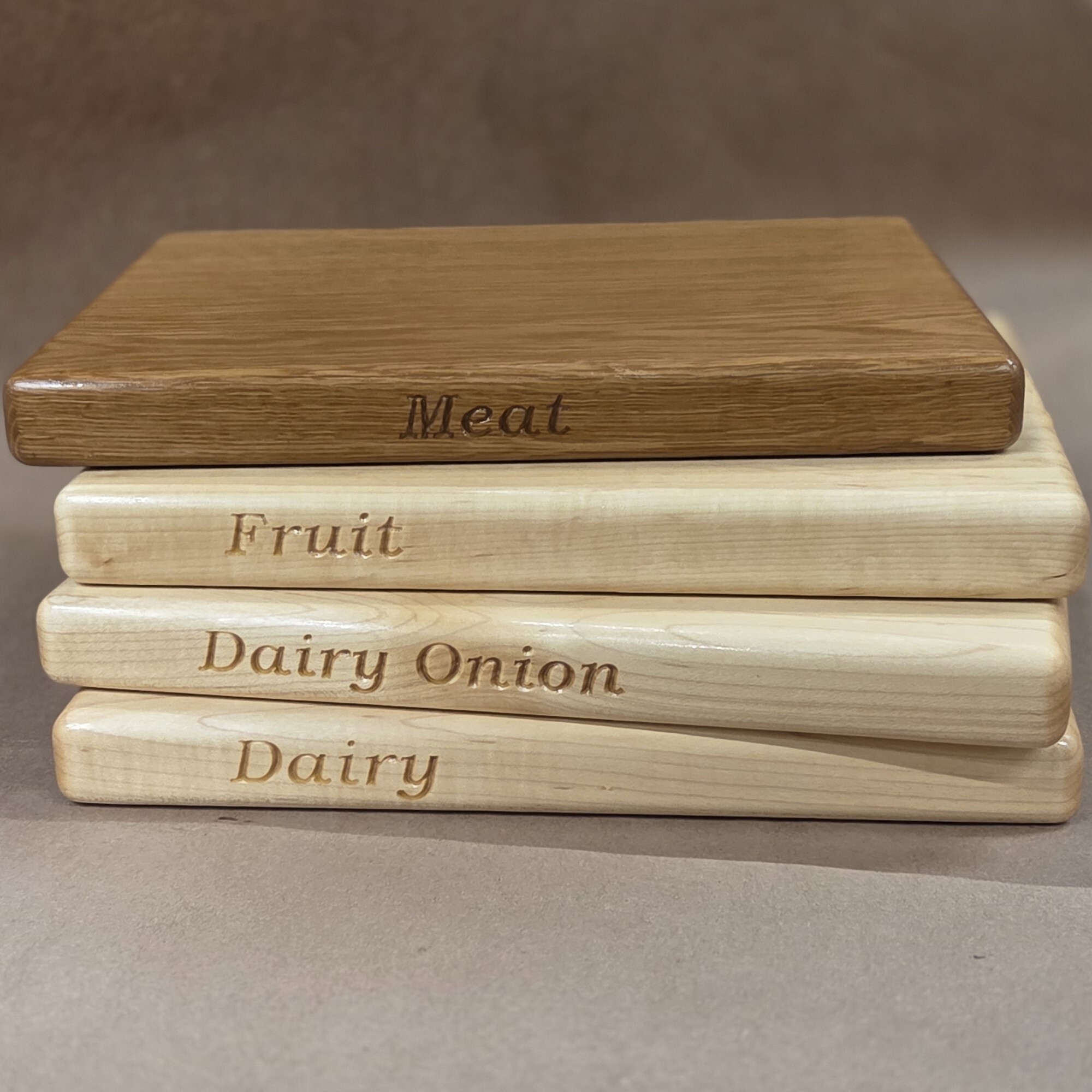 Engraved cutting boards by Treeboard, including for kosher homes and oak and cherry boards